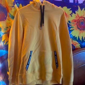 yellow sweatshirt